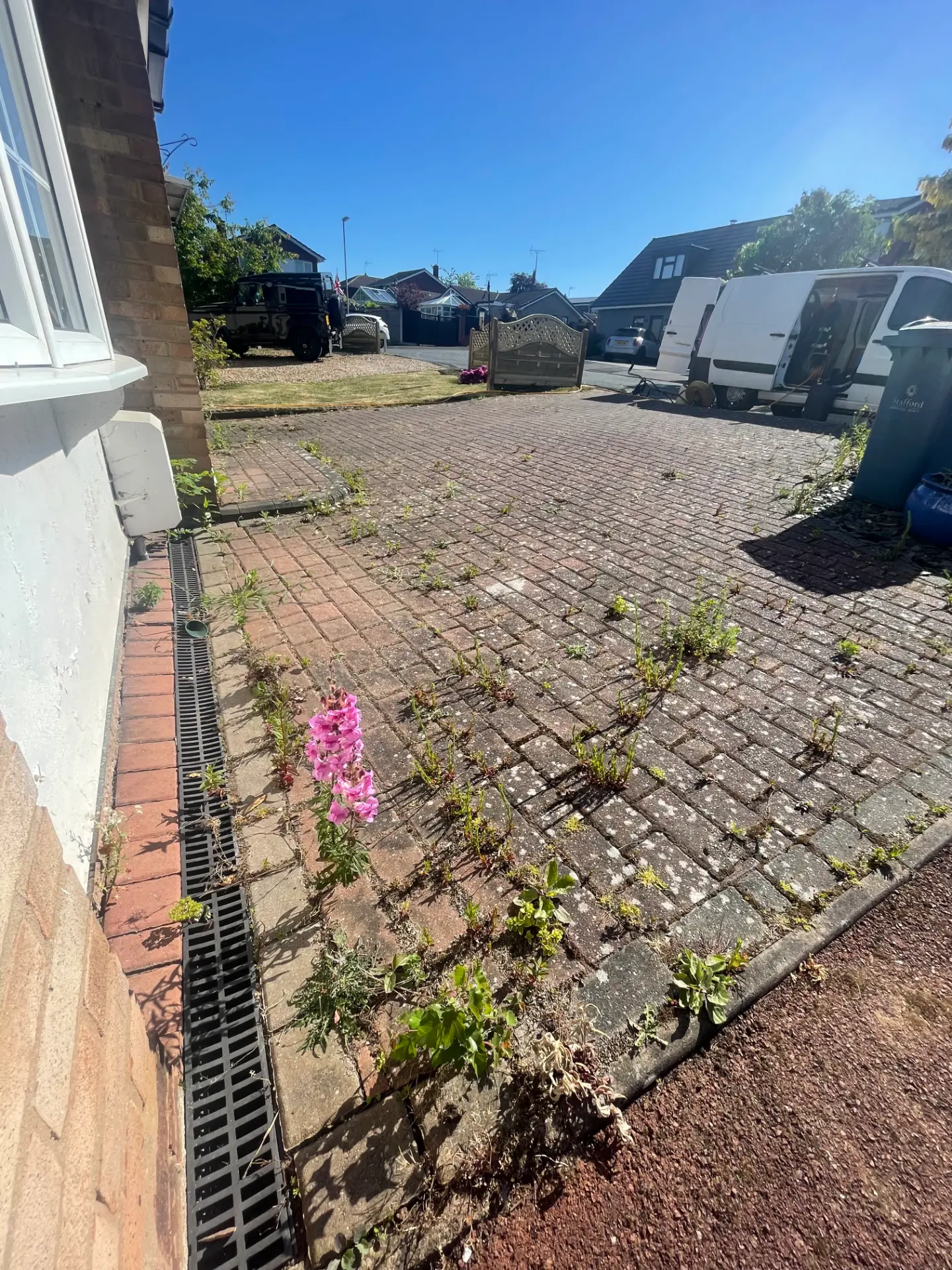 Driveway cleaning in Stafford by Sealstone Exterior Services, before professional cleaning