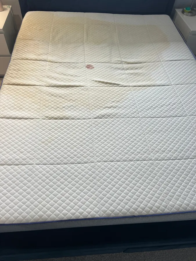 Sweat-marked mattress refreshed in Stafford, before professional cleaning