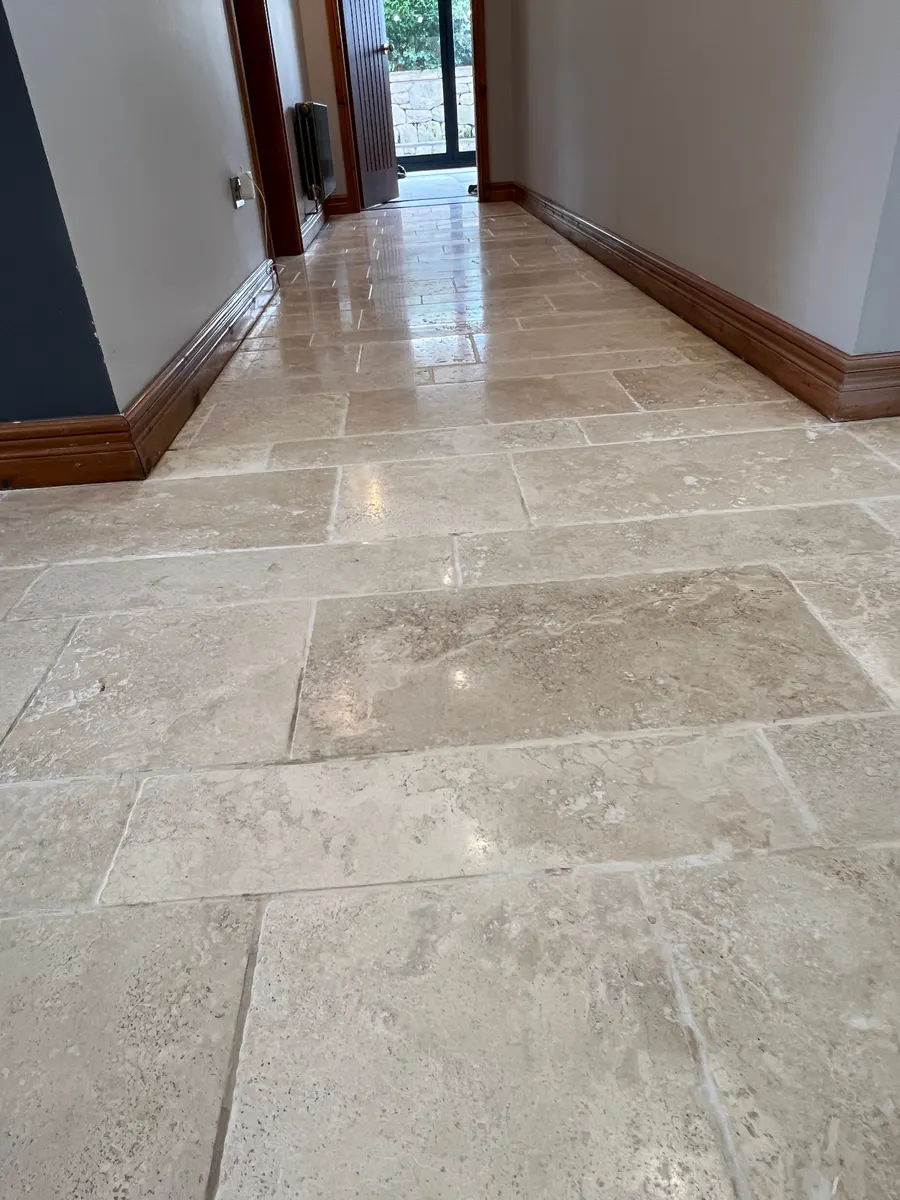 Polished natural stone hallway floor cleaned in Stafford, after professional cleaning