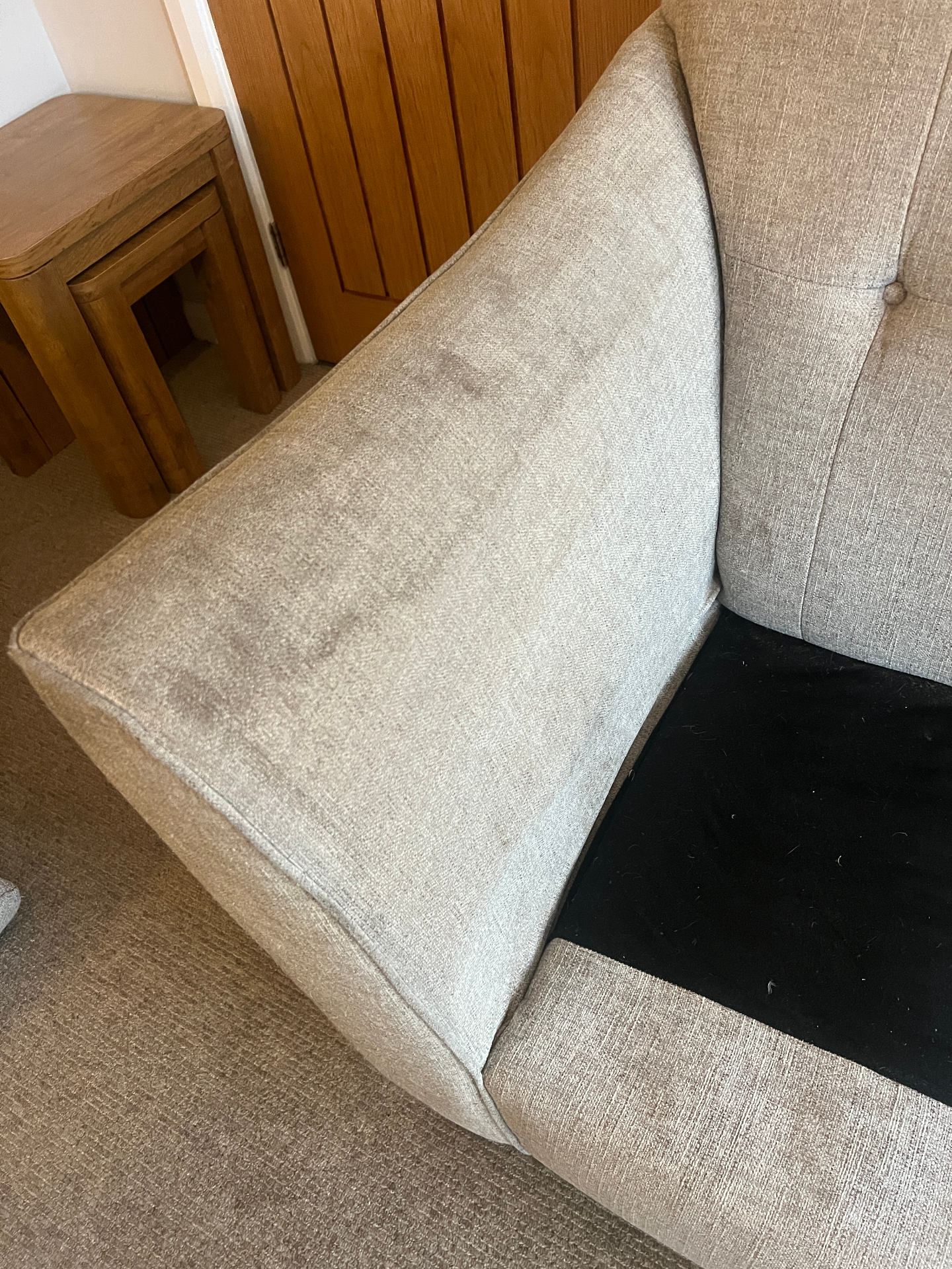 Stained sofa cushion cleaned in Stafford, before professional cleaning